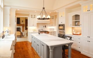 white kitchen with granite island